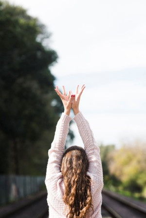 relaxed-girl-practicing-yoga-outdoor_23-2148201366